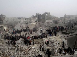 Khu dân cư ở thành phố Aleppo (Syria) bị san bằng sau vụ tấn công ngày 18.2